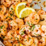 This lemon garlic butter shrimp recipe is so easy to make and just the right amount of spicy. Eat this garlic shrimp as an appetizer, main dish, or use it for tacos or salads.