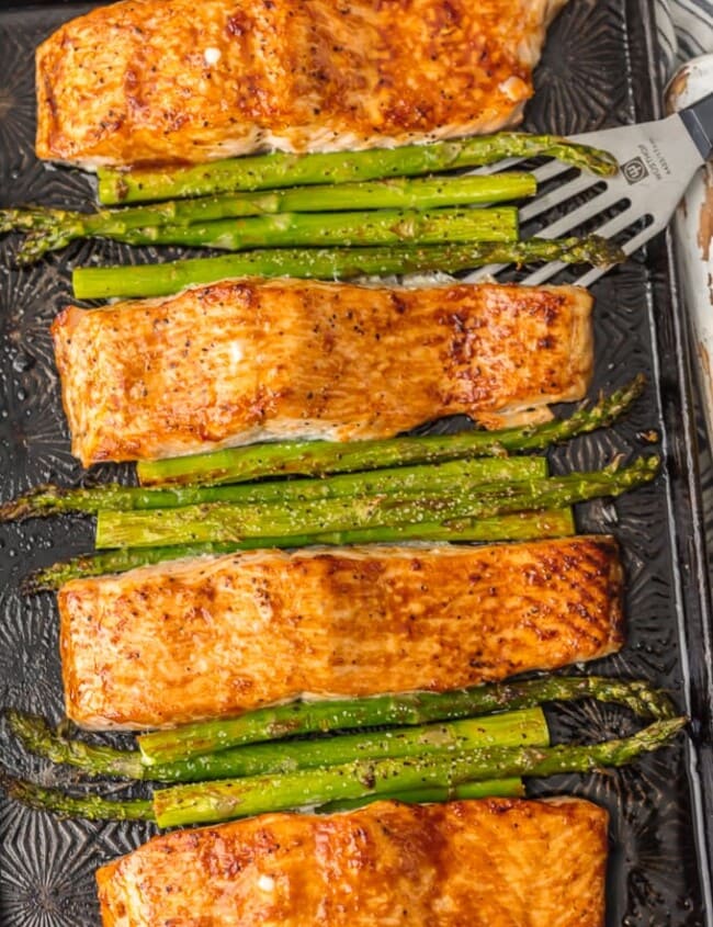 This HOISIN SALMON AND ASPARAGUS RECIPE has it all! It's a simple and healthy seafood recipe made entirely on ONE SHEET PAN. So much flavor and so little prep/cleanup. So much to love about this sheet pan glazed salmon.