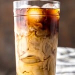 Iced Coffee is so easy to make at home, and even more delicious than you can buy at Starbucks or McDonalds! If you've ever wondered how to make Iced Coffee at home, you've come to the right place. This Iced Coffee is EASY, delicious, perfectly sweet, and so addicting. Having a glass of this Homemade Iced Coffee is the best way to start your day.