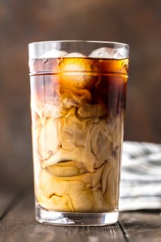 Iced Coffee is so easy to make at home, and even more delicious than you can buy at Starbucks or McDonalds! If you've ever wondered how to make Iced Coffee at home, you've come to the right place. This Iced Coffee is EASY, delicious, perfectly sweet, and so addicting. Having a glass of this Homemade Iced Coffee is the best way to start your day.