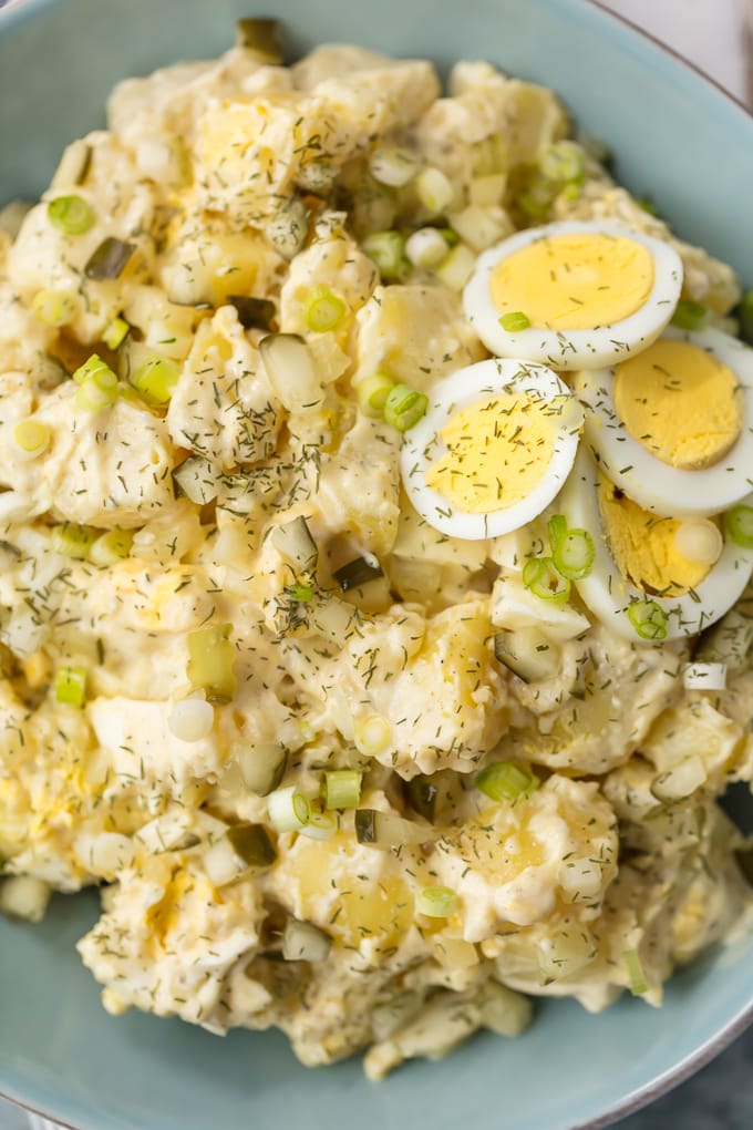 potato salad with dill pickles and hard-boiled eggs