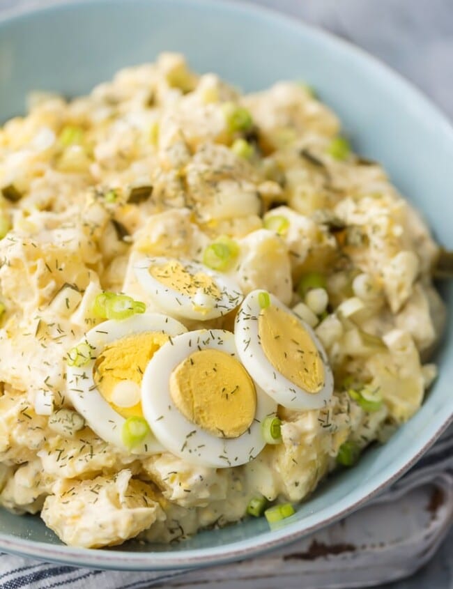 Instant Pot Potato Salad with Dill Pickles is an awesome side dish for Easter, Summer, and anytime in between. Potato Salad is a must make for Summer BBQs and this Dill Pickle Potato Salad is our favorite recipe. Creamy, easy, and so quick in a pressure cooker. If you wondered how to make potato salad in an Instant Pot, today is your lucky day!