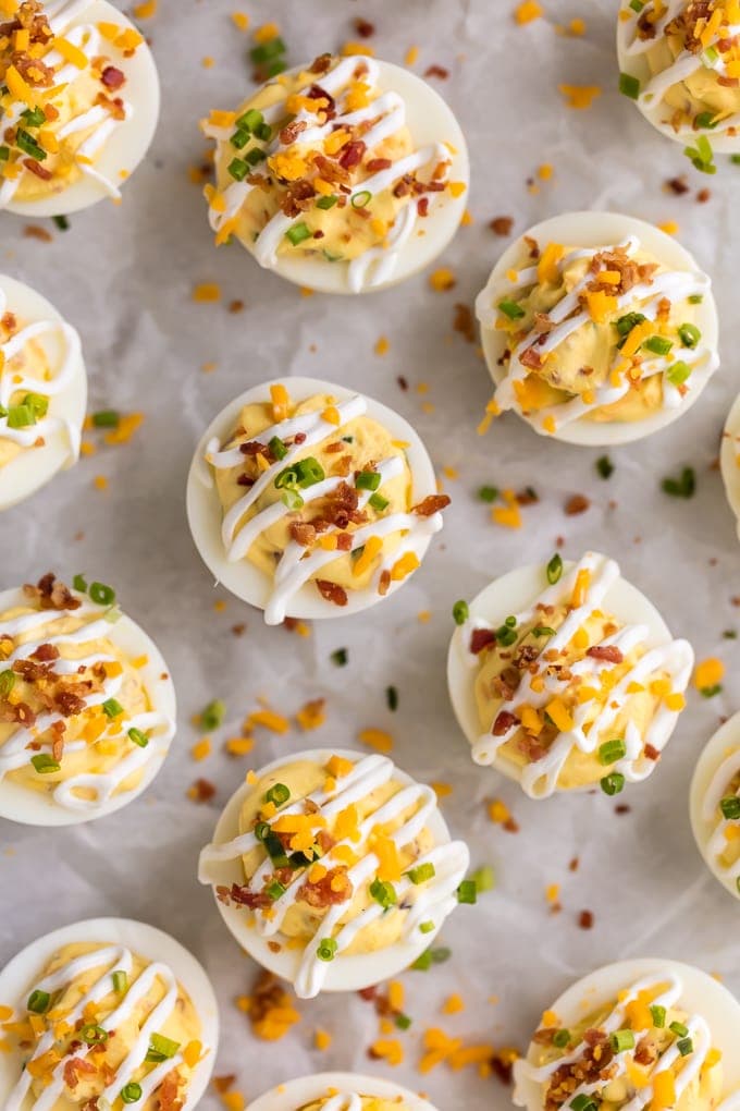 up close shot of loaded deviled eggs on parchment