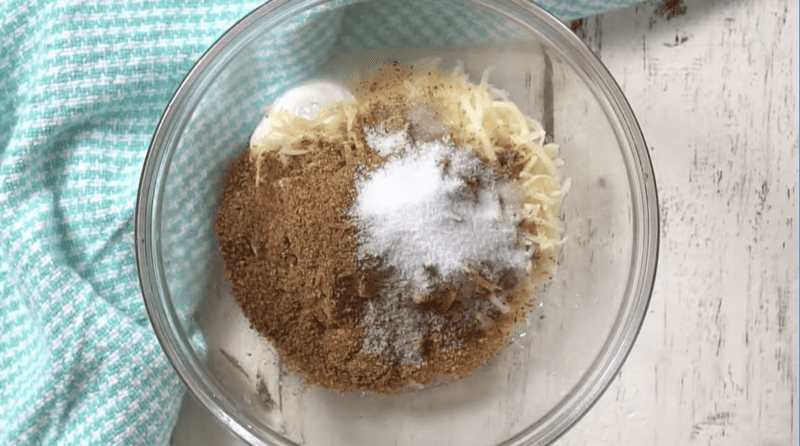 ingredients for street corn sauce in a glass bowl.