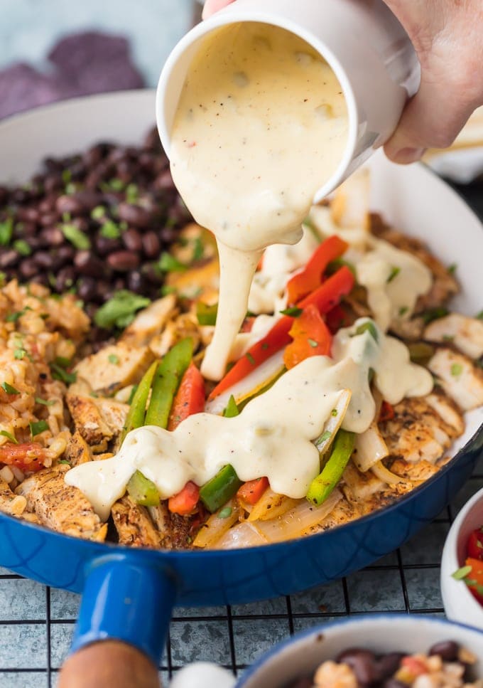 Chicken Fajitas smothered in queso