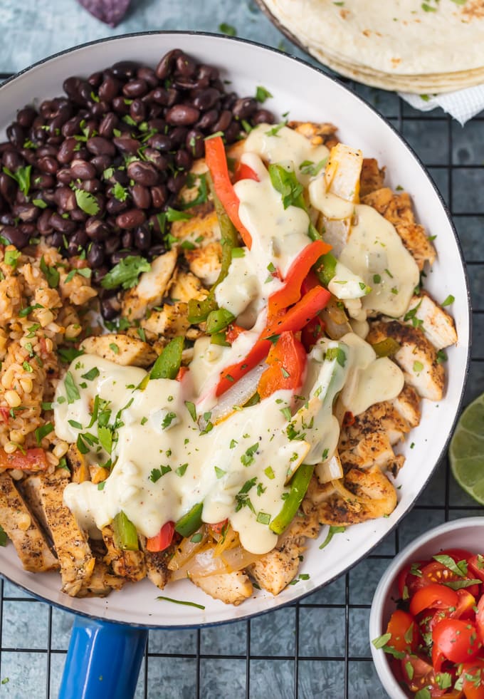 beans, peppers, and chicken in a skillet