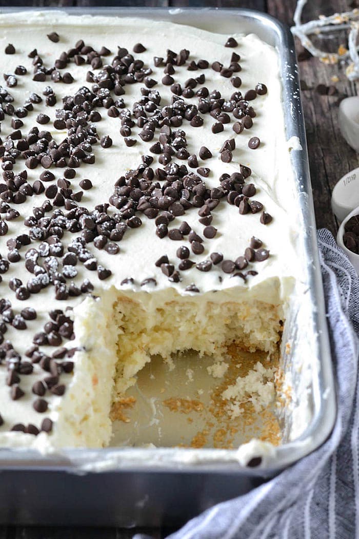 Cannoli Cream Poke Cake | Mother Thyme Poke Cake Recipes are a favorite at our house. There's nothing better than a Jello Poke Cake Recipe to make a celebration unique, tasty, and most importantly EASY! These 10 Pudding Poke Cake Recipes are simple. creamy, flavorful, and creative. Enjoy!