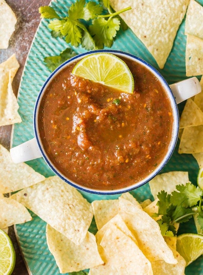 easy salsa recipe made in a blender in a bowl with chips