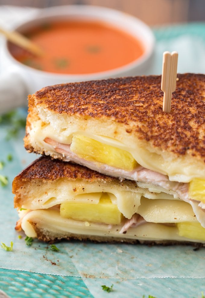 Hawaiian Pizza Grilled Cheese is my favorite Grilled Cheese Recipe for busy days and nights. Tips and tricks for how to make the PERFECT Grilled Cheese included in this delicious sandwich loaded with cheese, ham, and pineapple. This Pizza Grilled Cheese is a delicious twist on a classic recipe loved by both kids and adults!