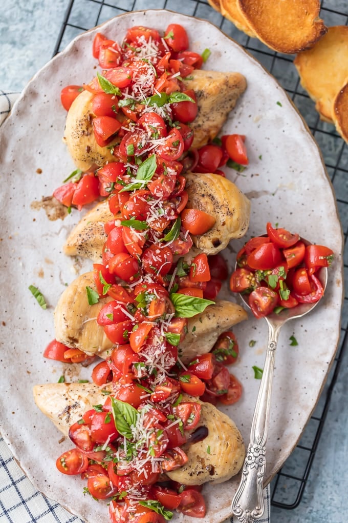 chicken breast topped with tomatoes