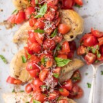 Instant Pot Chicken Bruschetta is a fresh, light, quick, and EASY Instant Pot Chicken Recipe! Bruschetta Chicken with tomatoes, basil, balsamic, and parmesan cheese has always been one of my favorite recipes, and it's only better made in an instant pot! Instant Pot Bruschetta Chicken is one of our go-to easy weeknight meals.