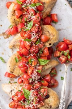 Instant Pot Chicken Bruschetta is a fresh, light, quick, and EASY Instant Pot Chicken Recipe! Bruschetta Chicken with tomatoes, basil, balsamic, and parmesan cheese has always been one of my favorite recipes, and it's only better made in an instant pot! Instant Pot Bruschetta Chicken is one of our go-to easy weeknight meals.
