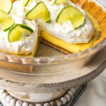 key lime pie on a cake stand