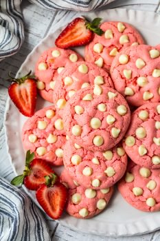 Strawberry Cookies are my favorite Strawberry Cake Mix Cookies! These White Chocolate Strawberry Cake Mix Cookies are so fun and delicious, and so super easy! Fun, festive, and SUPER SIMPLE! Strawberry Cookies with White Chocolate Chips are the perfect Pink Cookies for Valentine's Day, Easter, baby and wedding showers, and beyond! This Cake Mix Cookies Recipe will blow your mind.