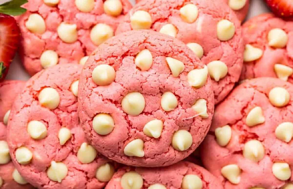 Strawberry cake mix cookies with strawberries and white chocolate chips.