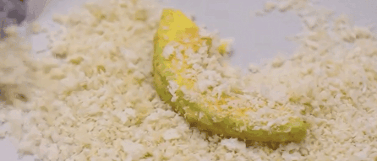 Coating the avocados in flour mixture, then egg and then panko. 