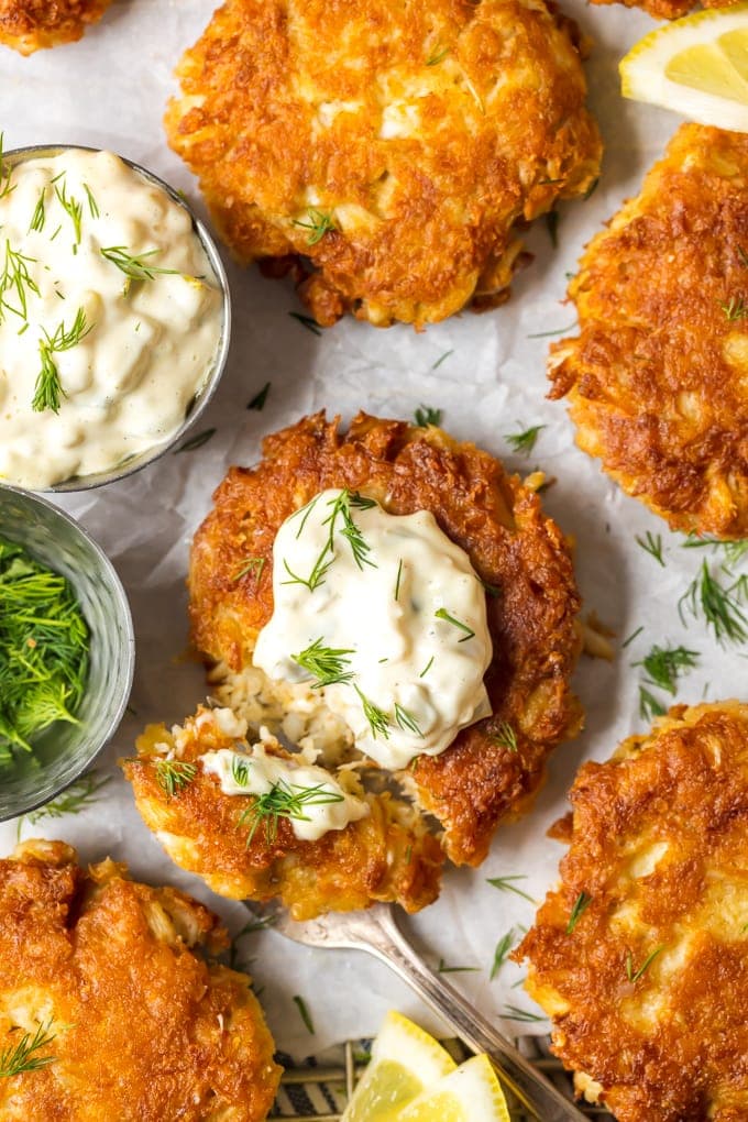 crab cakes topped with tartar sauce