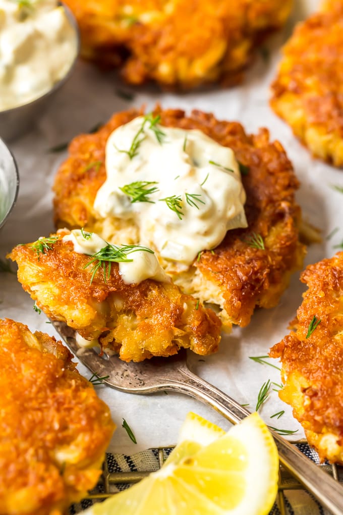 Close up of Baltimore Crab Cakes with a dollop of tartar sauce