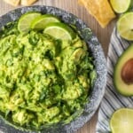 The BEST GUACAMOLE RECIPE EVER! I'm a big fan of Mexican food and dips. So of course I'm obsessed with guacamole too. I cut this Simple Guacamole Recipe down to the basics and it is so fresh. Everything blends together to create the perfect, creamy flavor. This Homemade Guacamole Recipe is my favorite dip for Mexican dinners. I could eat it alll day!