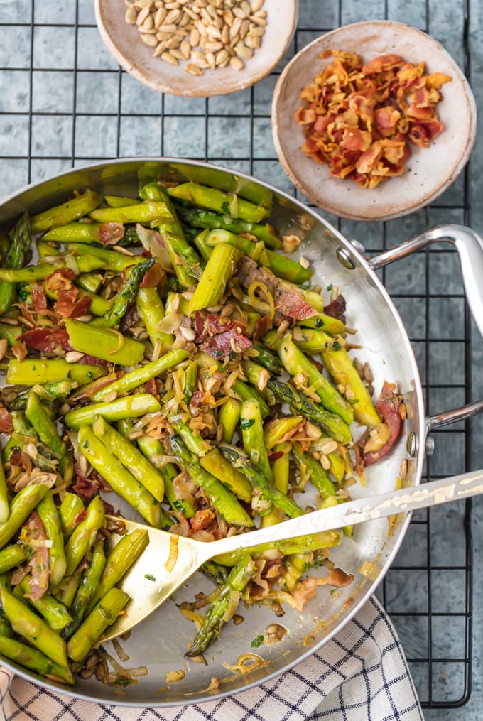 A mixture of asparagus, leeks, Pancetta, garlic, in a skillet