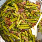 SAUTEED ASPARAGUS is the perfect side dish for any meal, and the Pancetta makes it even better! The leeks, garlic, and pine nuts add so much flavor to this dish...it just might be the Best Asparagus Recipe I've ever had. This Sauteed Asparagus Recipe with Pancetta is good enough to eat on its own, but it pairs well with other pork recipes.