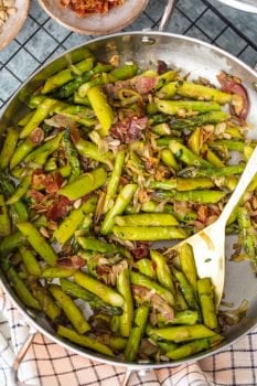SAUTEED ASPARAGUS is the perfect side dish for any meal, and the Pancetta makes it even better! The leeks, garlic, and pine nuts add so much flavor to this dish...it just might be the Best Asparagus Recipe I've ever had. This Sauteed Asparagus Recipe with Pancetta is good enough to eat on its own, but it pairs well with other pork recipes.