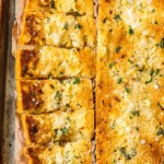 homemade garlic bread on foil