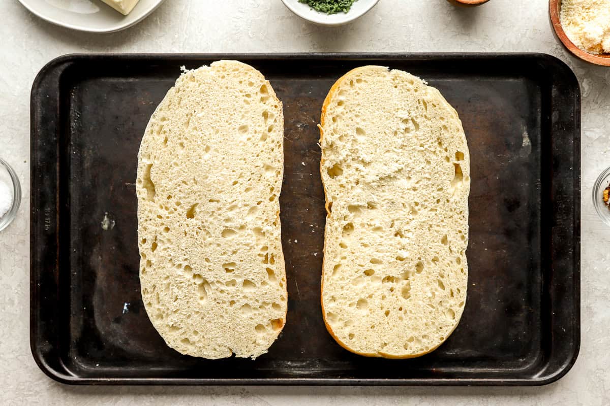 sliced loaf placed on a baking sheet