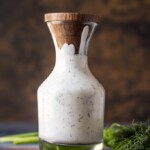 This Homemade Ranch Dressing Recipe is super creamy and full of flavor! Forget the store-bought ranch, and learn how to make ranch dressing at home instead. You'll be making this Easy Ranch Dressing Recipe for every salad, every veggie plate, and every party dip.