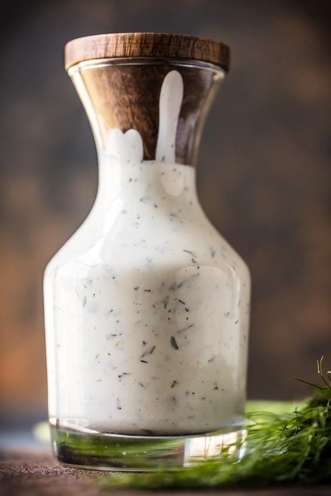 Glass jar filled with a homemade ranch dressing recipe