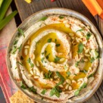Homemade Hummus is so creamy, so flavorful, and so healthy too! This is a delicious dip you can get away with eating every single day. Learn how to make hummus with the BEST hummus recipe ever. So easy and it tastes good with just about everything!