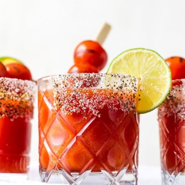 Roasted Tomato Margaritas put a twist on some classic cocktails. Mix the tequila and lime juice of a margarita with the tomato juice of a Bloody Mary, and you've got one fun and delicious drink. This easy margarita recipe is sure to please!