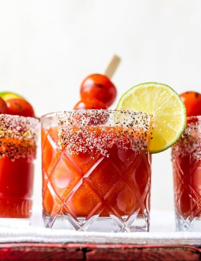 Roasted Tomato Margaritas put a twist on some classic cocktails. Mix the tequila and lime juice of a margarita with the tomato juice of a Bloody Mary, and you've got one fun and delicious drink. This easy margarita recipe is sure to please!