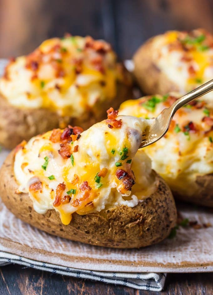 This is the BEST TWICE BAKED POTATOES RECIPE and I'm going to tell you exactly how to make it. This creamy, cheesy, crispy Twice Baked Potato recipe is just too good and I can't get enough of it. These potatoes are the perfect side dish for any meal. They are filled with all the best ingredients and they're absolutely filled with flavor too!