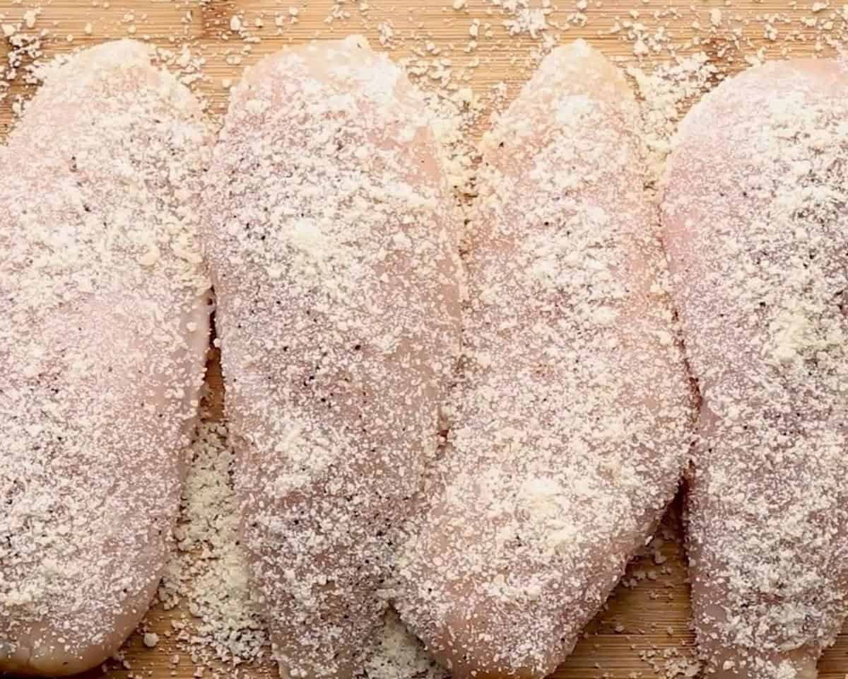 Breaded and seasoned chicken breasts.