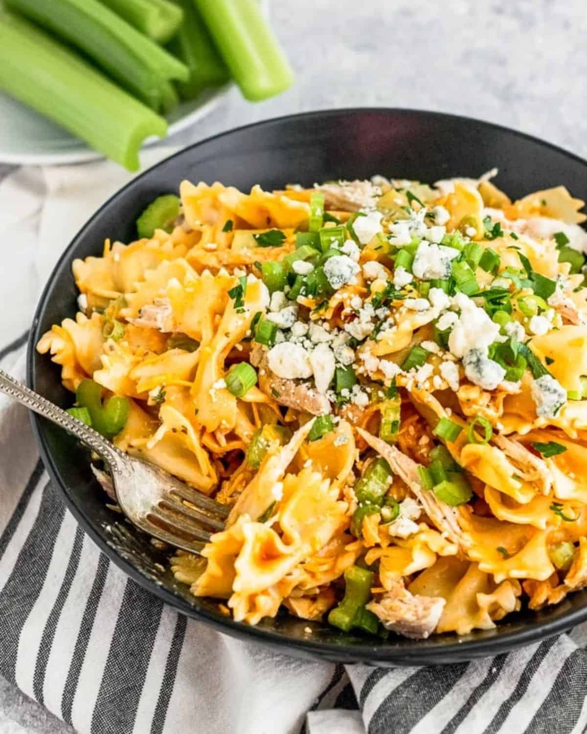 Buffalo Chicken Pasta Salad is the perfect BBQ side dish! I love the classic Buffalo Chicken flavors, so adding that into a pasta salad recipe is such a great combo. It's just the right amount of spice and heat to add to any summertime spread. This Easy Pasta Salad Recipe is so unique and delicious!