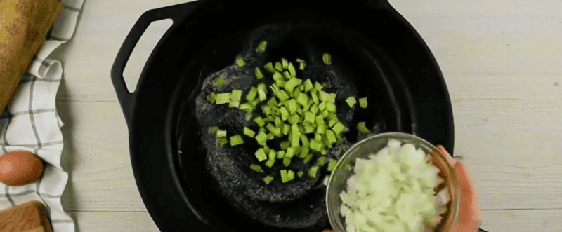 Cooking the aromatics for the hand pies.