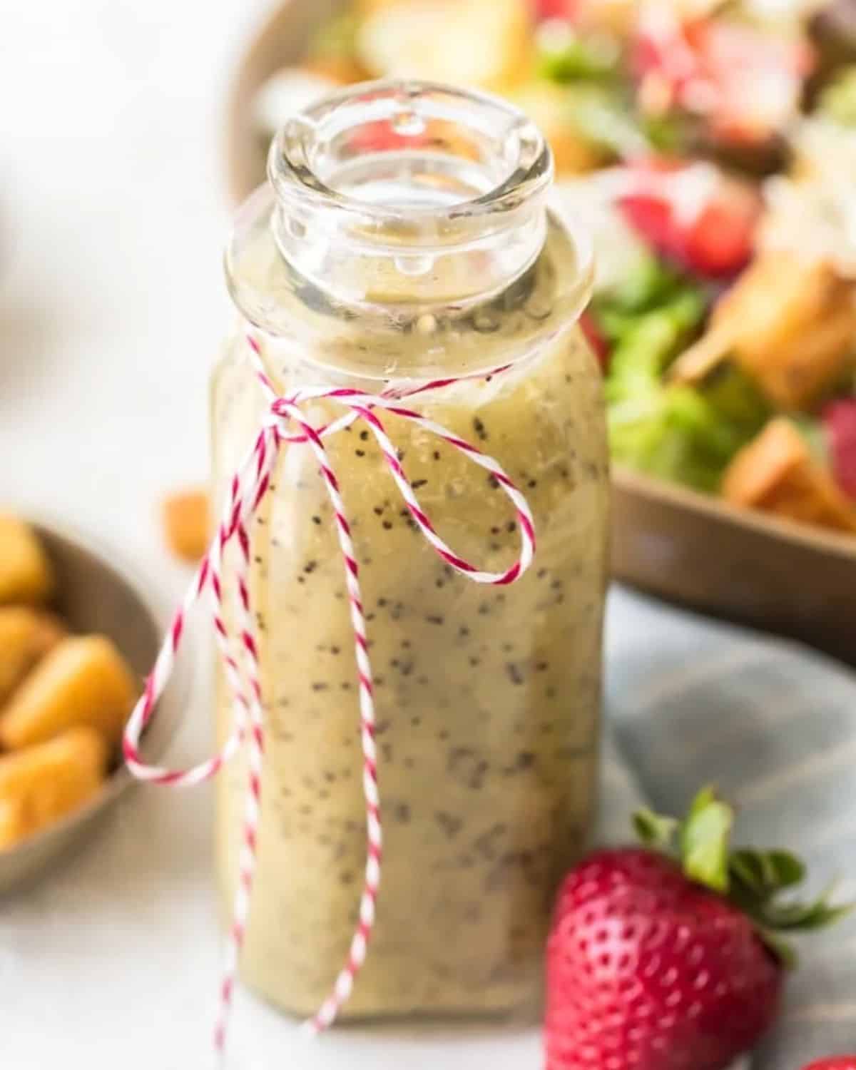 Jar of poppy seed dressing. 