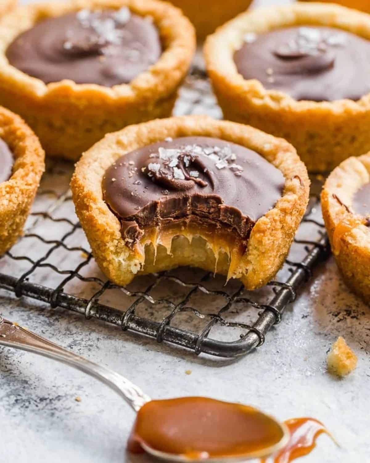 Twix cookie cup with a bite taken out of it.