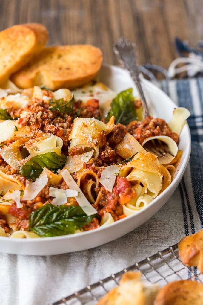 Beef Bolognese is a delicious meat-based sauce served with pasta, and topped with basil and freshly grated cheese. This is the best bolognese sauce recipe outside of Italy! A bowl of beef bolognese