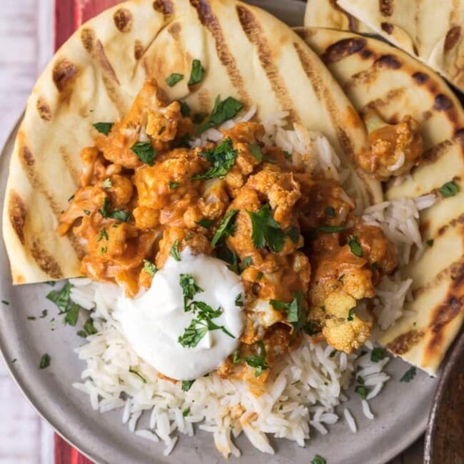 This vegetarian tikka masala recipe is made with cauliflower (Gobi Masala), served with basmati rice & naan. Roasted cauliflower mixed with tomato-based curry & plenty of spices!