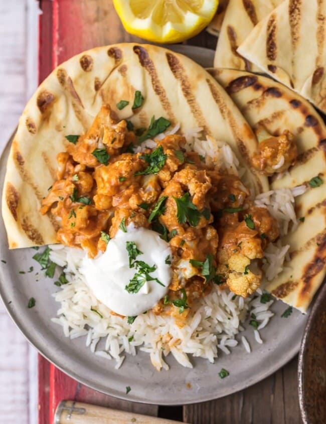 This vegetarian tikka masala recipe is made with cauliflower (Gobi Masala), served with basmati rice & naan. Roasted cauliflower mixed with tomato-based curry & plenty of spices!
