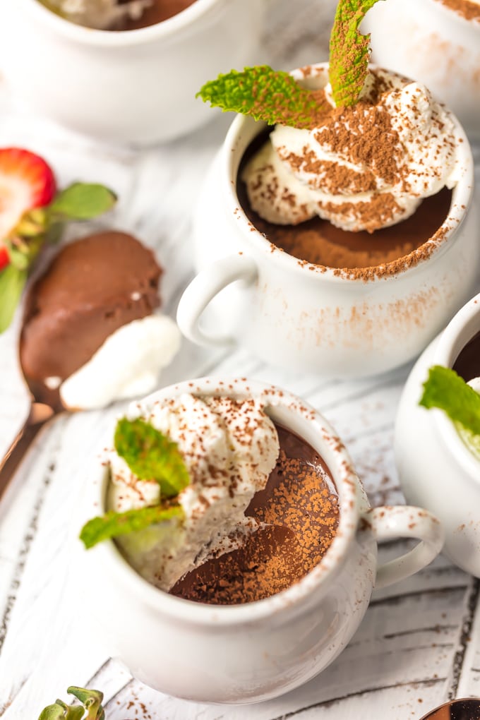chocolate custard dessert in small white pots