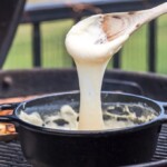 Easy Cheese Fondue with Grilled Bread is such a fun, quick, and EASY appetizer to make on the grill this Summer! There's nothing more satisfying that toasted bread dipped in cheese dip...especially if the cheese dip only have THREE INGREDIENTS! This easy fondue recipe with grilled bread is my idea of the ultimate and perfect appetizer!