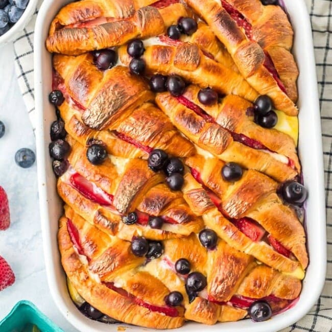 croissant french toast casserole in a white dish