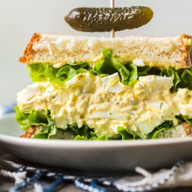 This classic Egg Salad Sandwich recipe is the perfect easy lunch recipe. Learn how to make egg salad sandwiches with the perfect mix of eggs, mayonnaise, and herbs.