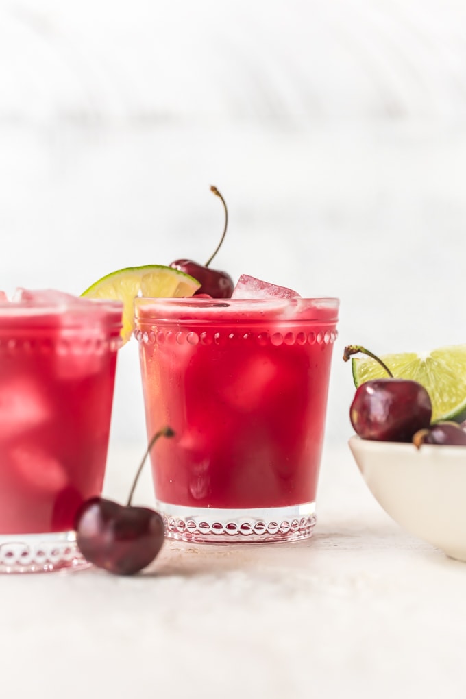 This homemade cherry limeade recipe is filled with fresh cherries & limes. One of the most refreshing summer drinks, with or without alcohol!