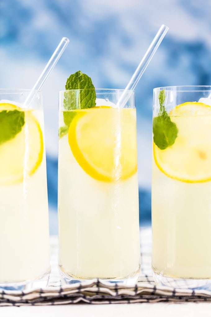 3 glasses of lemonade with straws