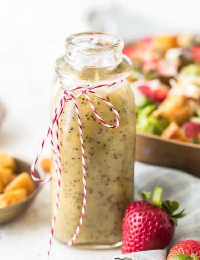 Poppy Seed Dressing is the perfect summer salad dressing. It's light, a little bit sweet, and full of flavor! This homemade poppy seed dressing recipe is super easy to make. It's pairs perfectly with my Strawberry Poppyseed Salad, but it goes well with all kinds of salads. Make some of this poppy seed salad dressing for yourself and dig in to some fresh, tasty salads!