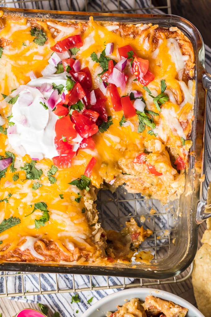 King Ranch Chicken topped with sour cream and tomatoes